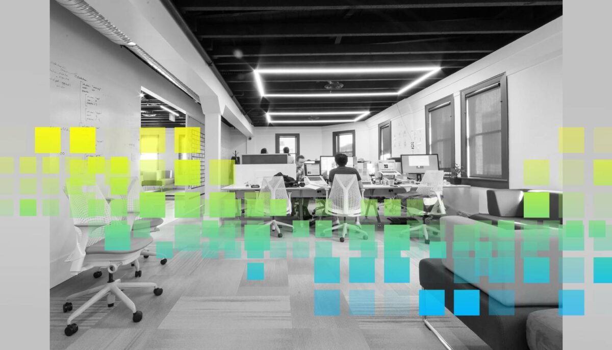 People working at their desks in an office