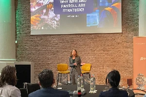 Anita Lettink speaking to executives about global payroll strategies